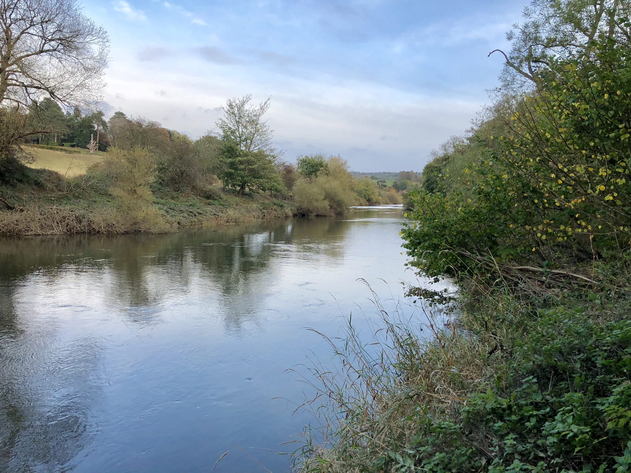 A calm photo of the river severn on a grey day