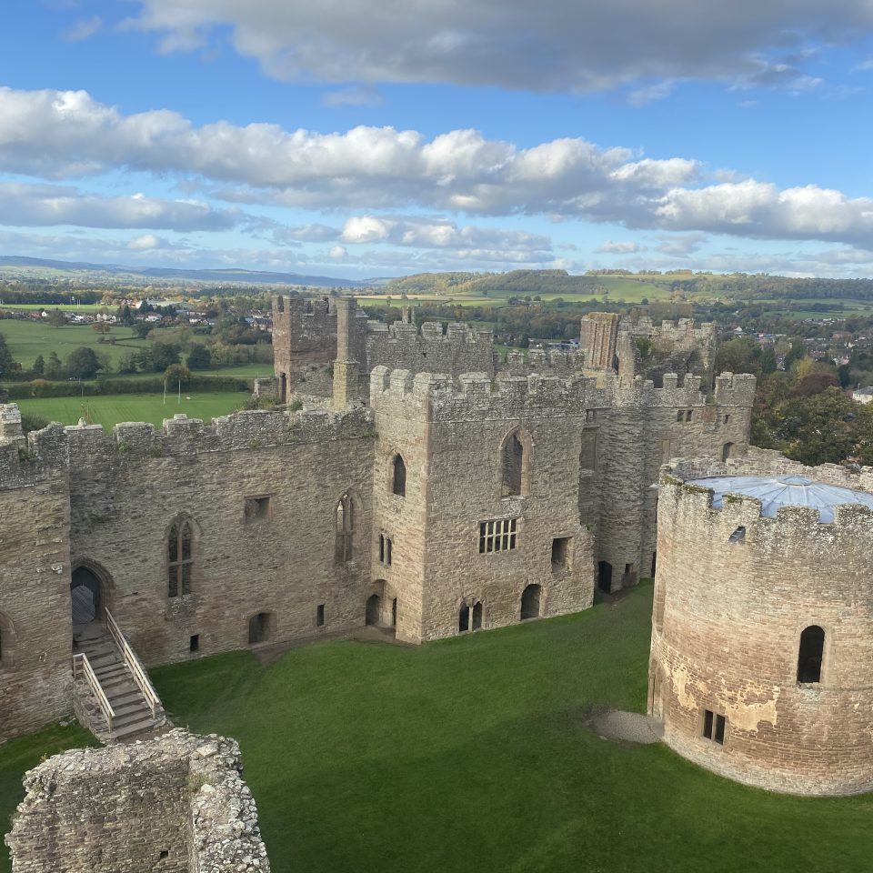 A drone's view of Ludlow castle with its high walls and turrets.