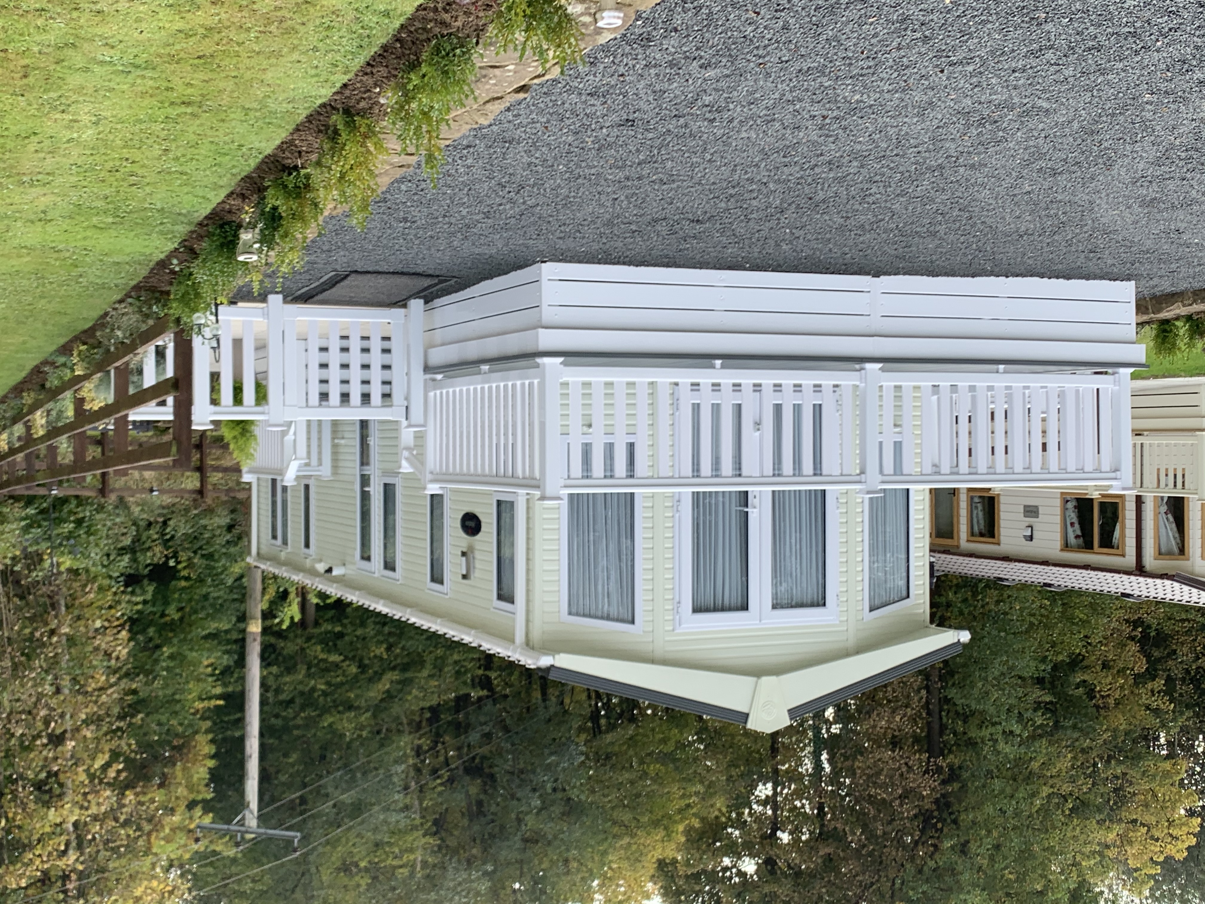 A brand-new Pemberton Marlow with decking and balustrade fitted to the front and side.