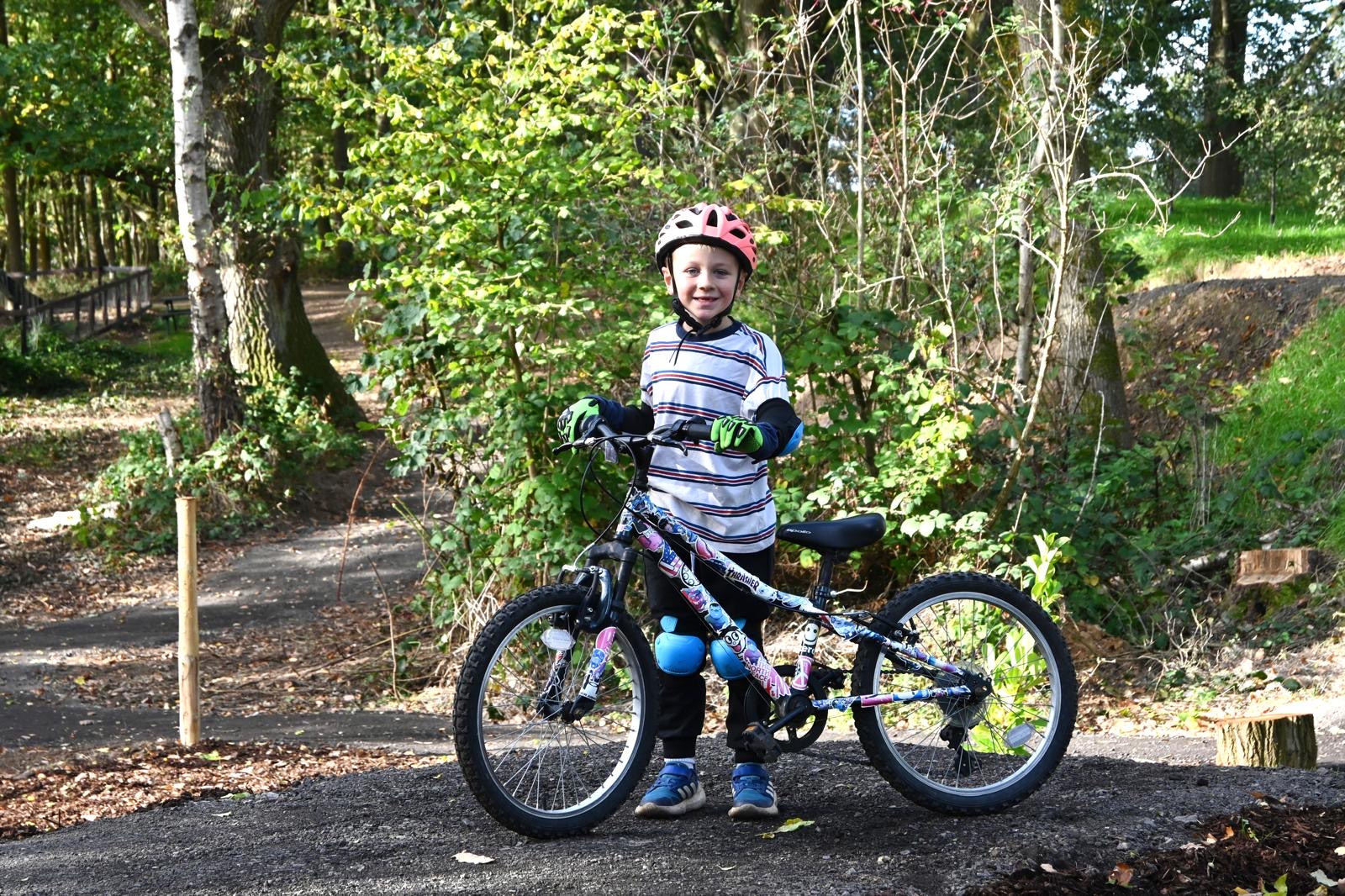 Young child with bicycle